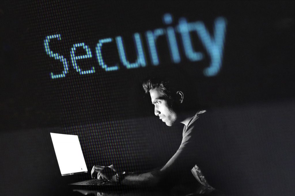 An image of a webmaster creating a secure website for a business.